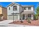 Charming two-story home with a well-maintained front yard, attached garage, and inviting curb appeal at 11143 Castellane Dr, Las Vegas, NV 89141