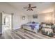 Cozy main bedroom featuring neutral tones, a comfortable bed, and a seating area at 11143 Castellane Dr, Las Vegas, NV 89141