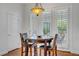 Breakfast nook with stylish lighting, creating an inviting atmosphere for dining at 11369 Rancho Villa Verde Pl, Las Vegas, NV 89138