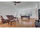 Spacious game room featuring a pool table and comfortable seating, perfect for entertaining guests at 11369 Rancho Villa Verde Pl, Las Vegas, NV 89138