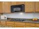 Gourmet kitchen featuring granite countertops and ample cabinet space at 11369 Rancho Villa Verde Pl, Las Vegas, NV 89138
