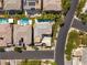 Aerial view highlighting the property's layout, pool, and manicured landscaping at 15 Gemstar Ln, Las Vegas, NV 89135
