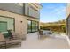Spacious patio area perfect for outdoor entertaining with comfortable seating and dining at 15 Gemstar Ln, Las Vegas, NV 89135
