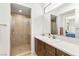 Modern bathroom with sleek countertop, tiled shower, and contemporary fixtures for a spa-like experience at 15 Gemstar Ln, Las Vegas, NV 89135