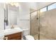 Cozy bathroom features a glass-enclosed shower, modern vanity, and stylish finishes at 15 Gemstar Ln, Las Vegas, NV 89135