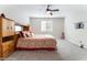 Bedroom with ceiling fan, carpet, and built in storage at 19 Cresta Villa Ct, Henderson, NV 89011