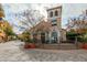 View of a commercial building featuring outdoor seating, stone accents, and inviting entrance at 19 Cresta Villa Ct, Henderson, NV 89011