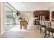 Spacious kitchen and dining area with stainless steel appliances and modern finishes at 19 Cresta Villa Ct, Henderson, NV 89011