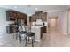 Modern kitchen with stainless steel appliances, an island with seating, and designer finishes at 19 Cresta Villa Ct, Henderson, NV 89011