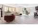Bright living room featuring neutral decor, wood floors, modern furnishings and natural light at 19 Cresta Villa Ct, Henderson, NV 89011