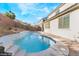 The backyard features a private pool, manicured landscaping, and exterior view of the home at 19 Cresta Villa Ct, Henderson, NV 89011