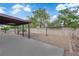 Large backyard area with covered patio and gravel landscaping for easy maintenance and outdoor enjoyment at 1913 Piccolo Way, Las Vegas, NV 89146