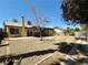Spacious backyard with a covered patio, providing ample room for outdoor entertaining at 1913 Piccolo Way, Las Vegas, NV 89146