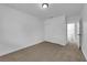 Bedroom features a closet with sliding doors and a glimpse into the bathroom at 1913 Piccolo Way, Las Vegas, NV 89146