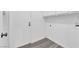 A clean laundry room features tiled floors and connections for a washer and dryer at 1913 Piccolo Way, Las Vegas, NV 89146