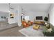 Stylized living room with carpeted floors, natural light, and open layout at 1913 Piccolo Way, Las Vegas, NV 89146