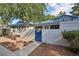 Charming single-story home with blue tile roof, gated courtyard, and mature trees in a well-maintained community at 2128 Petersham Ct # C, Las Vegas, NV 89108