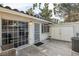 Enclosed patio with sliding glass doors, providing privacy and a seamless transition to indoor living at 2128 Petersham Ct # C, Las Vegas, NV 89108