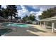 Community pool and spa area with lounge chairs and secure fencing for relaxing and safety at 2128 Petersham Ct # C, Las Vegas, NV 89108