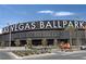 Exterior view of Las Vegas Ballpark, showcasing a modern architectural design and surrounding landscaping at 2208 Spring Water Dr, Las Vegas, NV 89134
