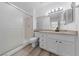 Bathroom featuring a walk-in shower and single sink vanity with granite countertops and modern fixtures at 2208 Spring Water Dr, Las Vegas, NV 89134