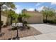 Charming single-story home with a two-car garage, mature landscaping, and a well-maintained front yard at 2208 Spring Water Dr, Las Vegas, NV 89134