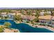 Aerial view of the home highlighting the backyard pool, landscaping, and waterfront location on a lake at 2209 Glenbrook Way, Las Vegas, NV 89117