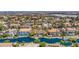 Aerial view of an estate home with defined property lines and a peaceful lake view at 2209 Glenbrook Way, Las Vegas, NV 89117