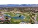 Stunning aerial view of a golf course community with lush greens and scenic lakes at 2209 Glenbrook Way, Las Vegas, NV 89117