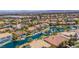 Stunning aerial view of an estate home with defined property lines with lake and mountain views at 2209 Glenbrook Way, Las Vegas, NV 89117