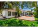Expansive backyard featuring a pool, patio and generous lawn space, perfect for outdoor enjoyment and entertaining at 2209 Glenbrook Way, Las Vegas, NV 89117