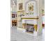Decorative fireplace features marble flooring and gold accents at 2209 Glenbrook Way, Las Vegas, NV 89117
