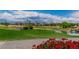 Picturesque golf course view with manicured greens, water features, and mountain views at 2209 Glenbrook Way, Las Vegas, NV 89117