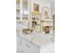 Bright kitchen with marble countertop, gold hardware, and fireplace at 2209 Glenbrook Way, Las Vegas, NV 89117
