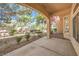 Outdoor patio with mature landscaping offering a private backyard retreat at 2330 Spring Water Dr, Las Vegas, NV 89134