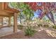Landscaped backyard featuring a covered patio and gravel for easy maintenance at 2330 Spring Water Dr, Las Vegas, NV 89134