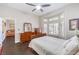Inviting bedroom with bay window, hardwood floors, ceiling fan and plenty of natural light at 2330 Spring Water Dr, Las Vegas, NV 89134