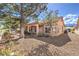 Single-story home with desert landscaping, bay windows and covered entryway at 2330 Spring Water Dr, Las Vegas, NV 89134