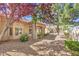 Single-story home with desert landscaping and a charming covered entrance at 2330 Spring Water Dr, Las Vegas, NV 89134
