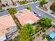 Desirable single-story home featuring a tile roof, mature landscaping, and private backyard at 2383 Rainswept Ave, Henderson, NV 89052
