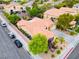 Inviting single-story home featuring a tile roof, lush landscaping, and a private driveway at 2383 Rainswept Ave, Henderson, NV 89052
