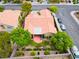 Aerial view of home with a cozy front yard, landscaping, and ample street parking at 2383 Rainswept Ave, Henderson, NV 89052