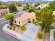 Beautiful home with mature trees, green grass, and great street view from above at 2383 Rainswept Ave, Henderson, NV 89052