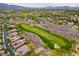 Breathtaking aerial view of a golf community with luxury homes surrounded by lush landscaping at 2383 Rainswept Ave, Henderson, NV 89052