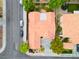 Aerial view of home showcasing its tile roof, neat landscaping, and surrounding neighborhood at 2383 Rainswept Ave, Henderson, NV 89052