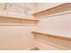 Walk-in closet with shelving and hanging space for storage at 2383 Rainswept Ave, Henderson, NV 89052