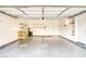 Spacious two-car garage with ample storage shelves and high ceilings at 2383 Rainswept Ave, Henderson, NV 89052