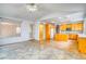 Bright kitchen features tile floors, light wood cabinets, modern appliances, and a vaulted ceiling at 2383 Rainswept Ave, Henderson, NV 89052