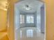Bright living room boasting tile flooring, large windows, and ceiling fan at 2383 Rainswept Ave, Henderson, NV 89052