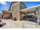 Home's backyard features a covered patio off the main house and garage at 248 Hyssop Ct, Henderson, NV 89015
